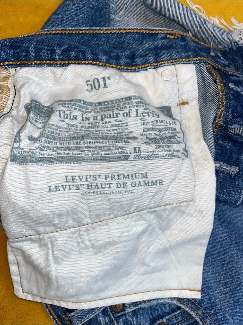 Levi’s High-Rise Distressed Denim Shorts — Blue